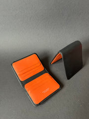 Компактний чорно-жовтогарячий чоловічий гаманець Visconti VSL34 Black/Orange